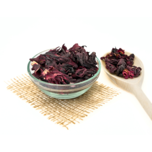 ceai hibiscus in bol si lingura de lemn